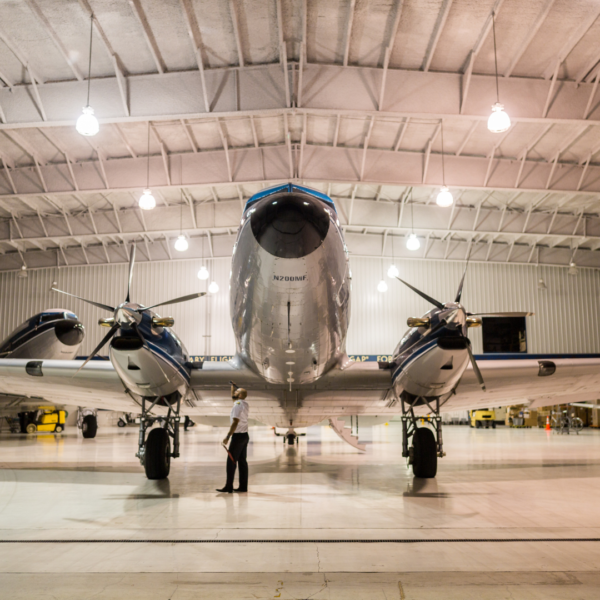 Person looking over an aircraft