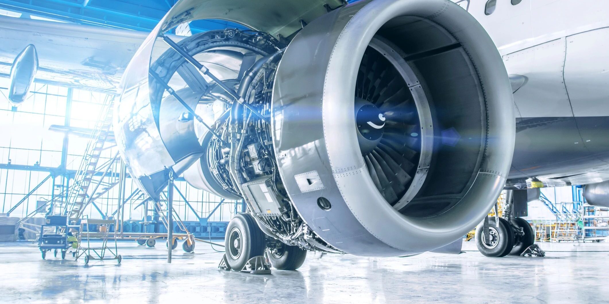 Industrial theme view. Repair and maintenance of aircraft engine on the wing of the aircraft